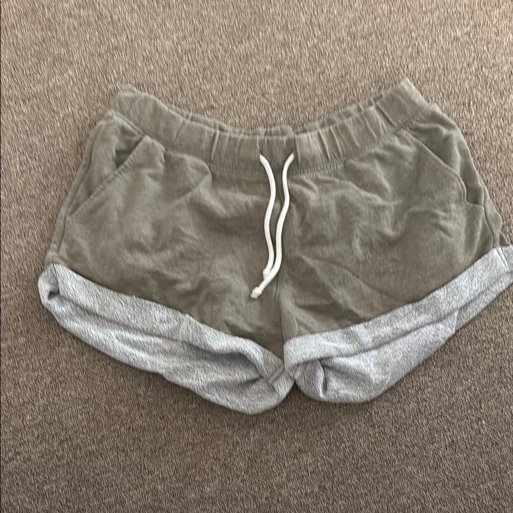 Green Sweat Shorts with Relaxed Fit and Dolphin Hem